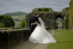Bride and Groom taking a  walk at Caerphilly Castle