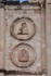 San Juan Bautista, façade, top tier, left side roundels