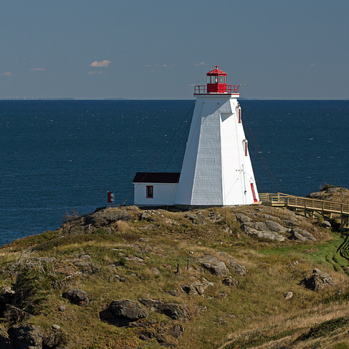 Swallowtail Lighthouse on Grand Manan. If you look closely along the horizon left, the wind turbines of Digby Head, N…