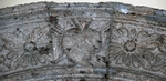 Cloister portal, keystone relief, pierced Augustinian heart