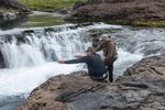 Mr Collings gets advice from guide Skuli