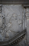 S portal left relief, angel holding a candlestick