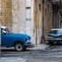 Old cars on the corner of Gloria, Havana