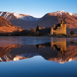 Kilchurn Castle, red sunrise, Loch Awe, Scotland.