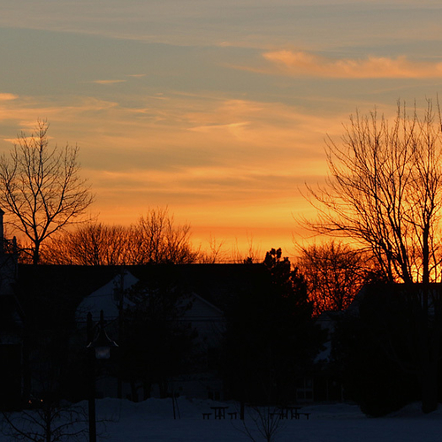 St.David's United Church silhouetted against a brilliant twilight sky.
