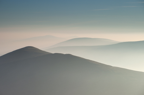 Late summer haze over the hills. Looking towards Carraghan and beyond to South Barrule and Cronk ny Arrey Laa. On the…