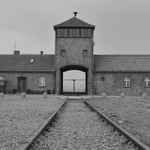 Black and White image of Auschwitz II-Birkenau gatehouse.