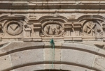 Façade, main portal, architrave with Passion symbols