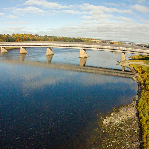 An aerial view of the Hartland Covered Bridge that spans the Saint John River at Hartland, New Brunswick, Canada.