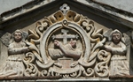 La Tercera Orden, sacristy door, pediment relief