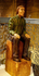 SEATED MAN IN GREEN