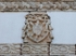 Upper façade, Augustinian insignia