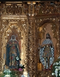 High altar, lower story, left statues