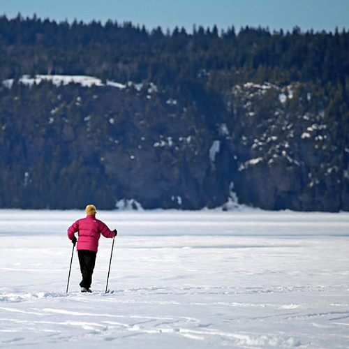 A cross country skier heads out towards Long Island on a mid winter's day.