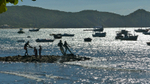 Bronze fishermen at sunset