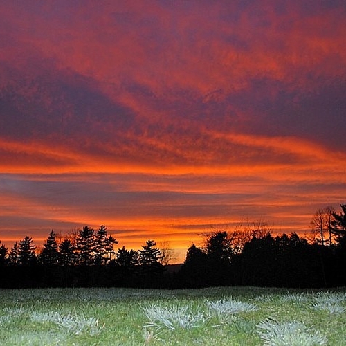 A vibrant summer sunset over Kings County, New Brunswick