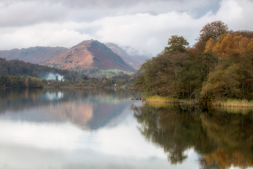 Grasmere with Helm Crag catching the brief splash of evening sunlight.