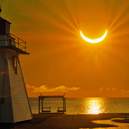 The partially eclipsed sun looking more like the crescent moon in this photo taken after sunrise on March 29th. 2025.