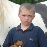 1, Young Boy with pup, Spancil Hill Horse fair, Co.Clare
