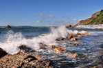 Waves roll in on a windy morning