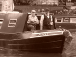 Two men on barge (sepia)