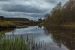 A stunning capture of Kilchurn Castle on an overcast day.