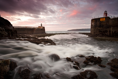 Dawn at the harbour entrance at Laxey (Laksaa - Manx). The name derived from the old Norse Laxa - meaning Salmon river.