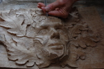 Carving The Face Of The Green Man