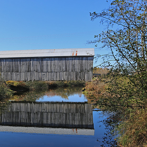 The Plumweseep covered bridge, Kennebecasis #9, is located along the Plumweseep road at Plumweseep near Sussex, New B…