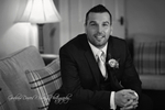 Miskin Manor groom getting ready b&w