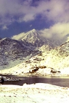 Snowstorm over Snowdon from Llyn Llydaw vertical