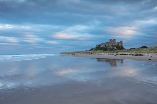 Bamburgh Castle in November evening light.