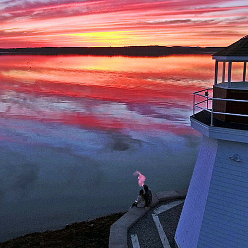 Spring Flood 2018 New Brunswick Canada - Renforth Lighthouse amid a swollen Kennebecasis River, reflecting a spectacu…