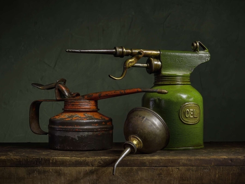 The Oel Can. Light-painted still-life, featuring three vintage oil cans. Lit with diffused torchlight.