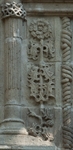San Bernardino, porciúncula portal, left pilaster relief