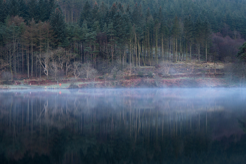 A hint of mist on the water at Injebreck reservoir.