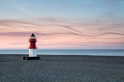 'Winky' beach lighthouse at the Point of Ayre at sunset.