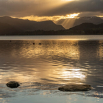 Winter sunset views over Ullswater looking towards the Helvellyn Range