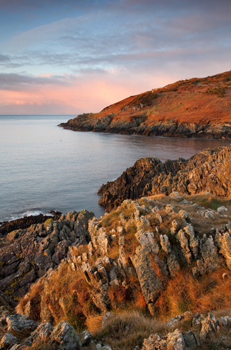 Early morning sunlight at Groudle looking towards Howstrake and the remains of the holiday camp with lovely foregroun…