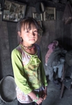 Montagnard girl in mountain village house