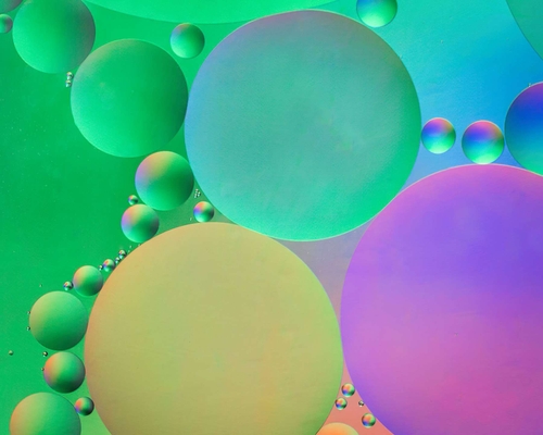 An evening's Camera Club activity, photographing oil droplets on water. The colours are provided by shining an LED to…