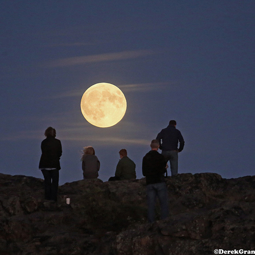 A crowd starts to gather for the Super Blood Moon rising over the Bay of Fundy in Saint John, New Brunswick, Canada.