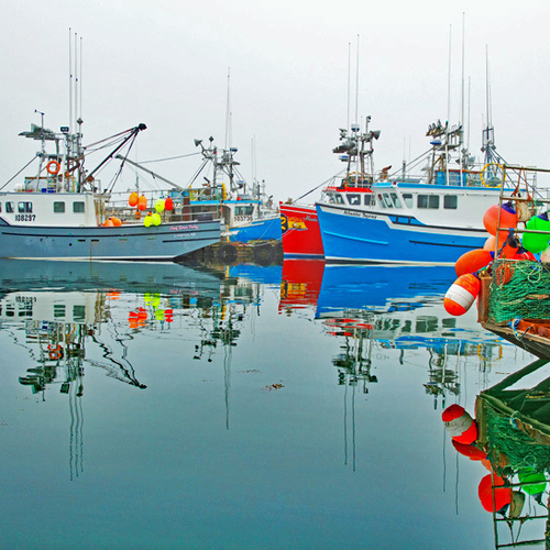Colourful fishing boats and tackle as seen at Seal Cove on Grand Manan Island in New Brunswick, Canada.