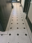 Amtico Bianca with clipped corner tiles and corner squares