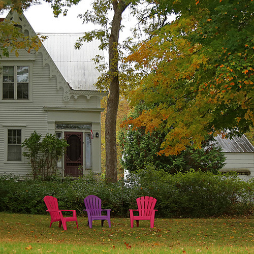 Notice the fine gingebread trim on this vintage homestead.