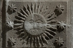Pillar base relief, sun (16th century church)