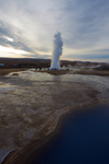 Strokkur erupts, Blesi hot water pools in the foreground