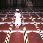 Young boy at prayer,Taj Mahal, India