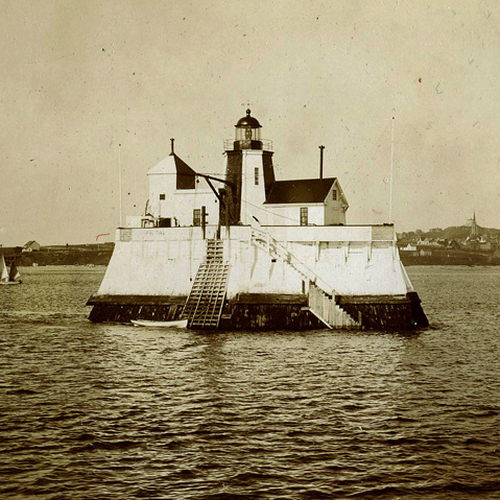 An early albumen photograph of the Beacon Lighthouse in Saint John Harbour with Martello Tower and the lower westside…