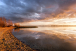 Lake Shore Stormy Sunset